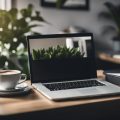 A desk cluttered with a laptop, notebook, and coffee mug. A calendar on the wall marked with deadlines. A plant in the corner