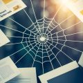 Various web pages connected by lines, resembling a spiderweb. Each page features different topics and is linked to others in a strategic manner