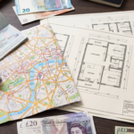 An organized arrangement of an international passport, detailed architectural floor plans, various paper currency notes, and a folded city map spread across a desk. The scene emphasizes the textures of the paper documents and the professional atmosphere of a global real estate review, with clear details on the blueprints and the map's markings.